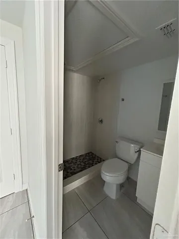 a bathroom with a toilet