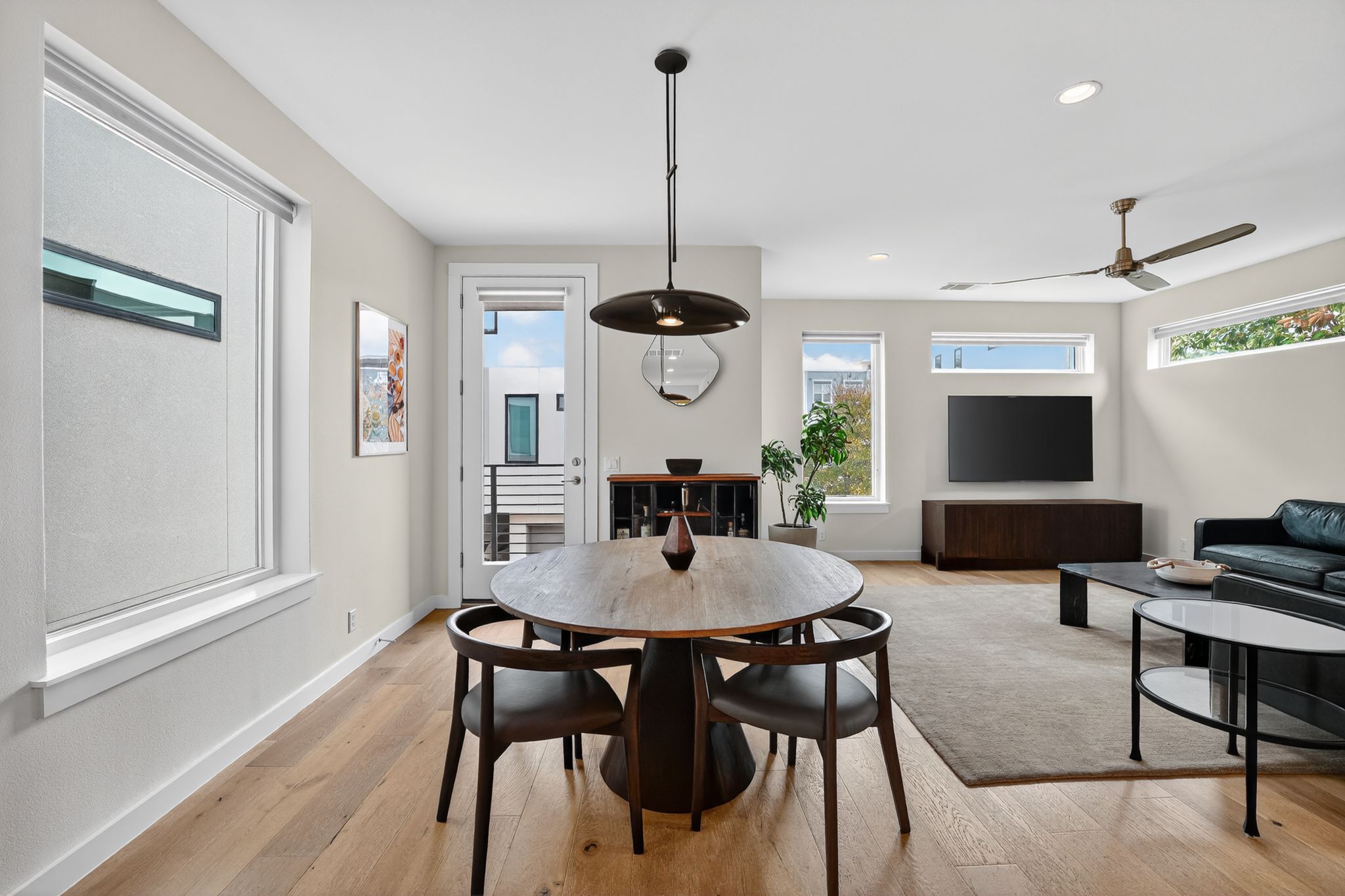 2301 Bluebonnet Lane, Unit 5 Austin, TX 78704 - Photo 10 of 26 Dining space featuring light wood-style floors, ceiling fan, and recessed lighting