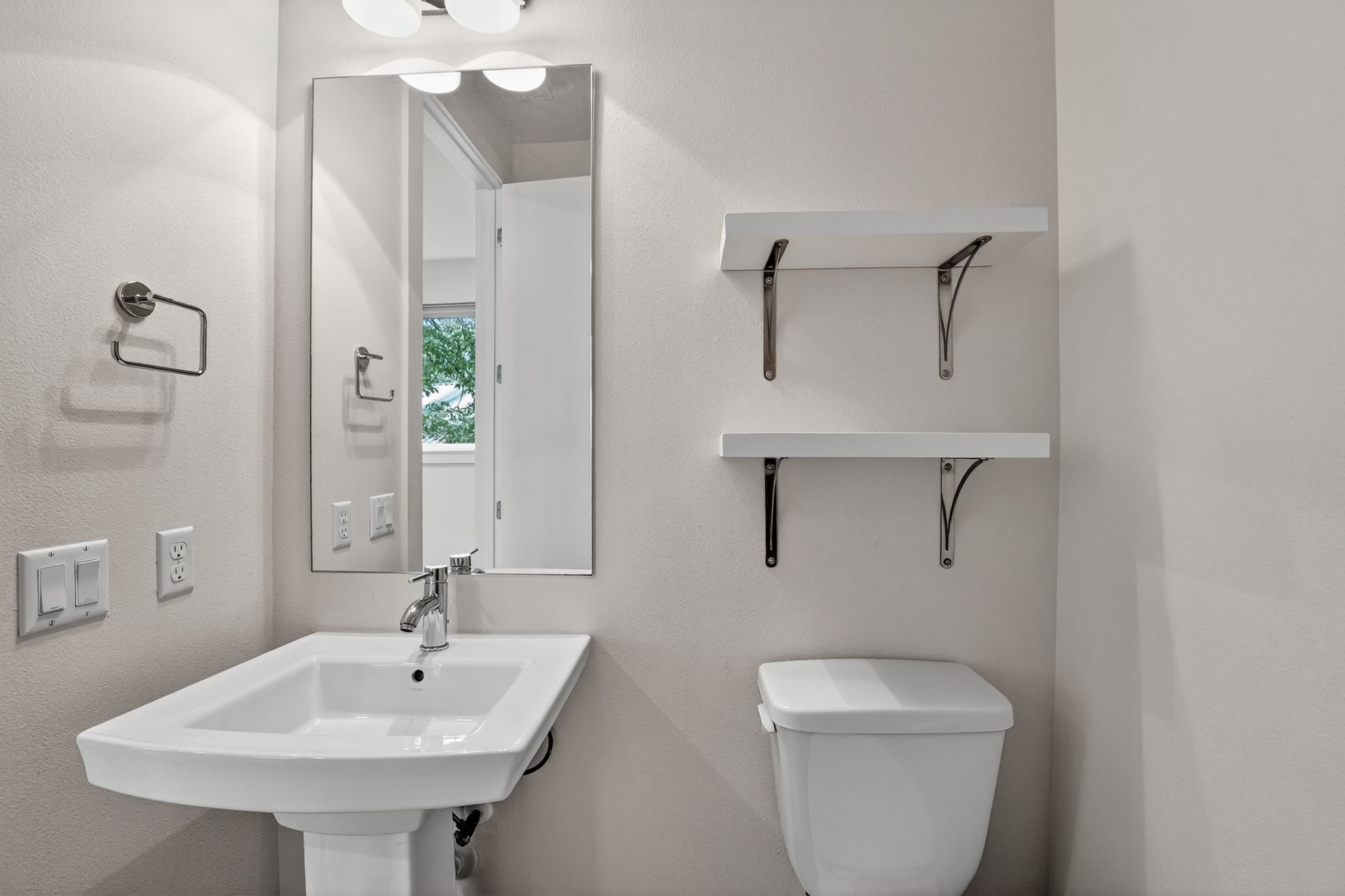 2301 Bluebonnet Lane, Unit 5 Austin, TX 78704 - Photo 14 of 26 Bathroom with toilet and a sink