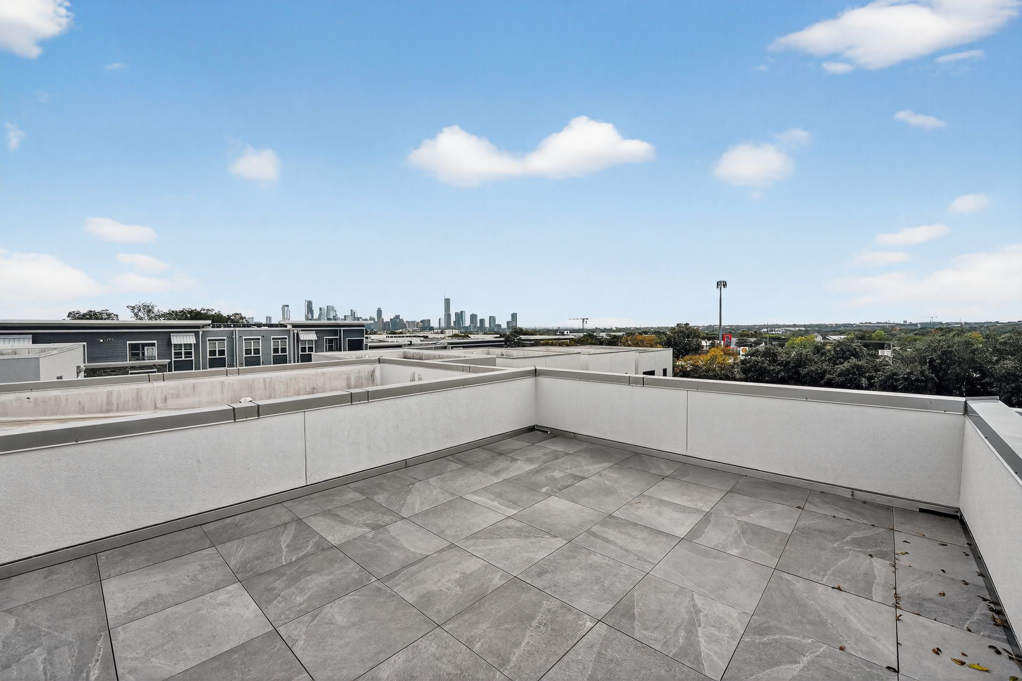 2301 Bluebonnet Lane, Unit 5 Austin, TX 78704 - Photo 24 of 26 View of patio / terrace with a view of skyline