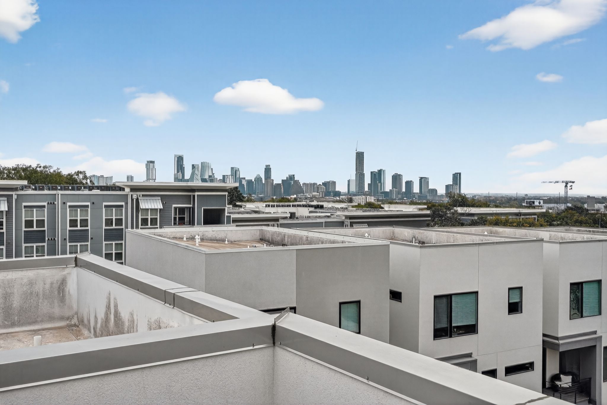 2301 Bluebonnet Lane, Unit 5 Austin, TX 78704 - Photo 25 of 26 Balcony featuring a skyline view