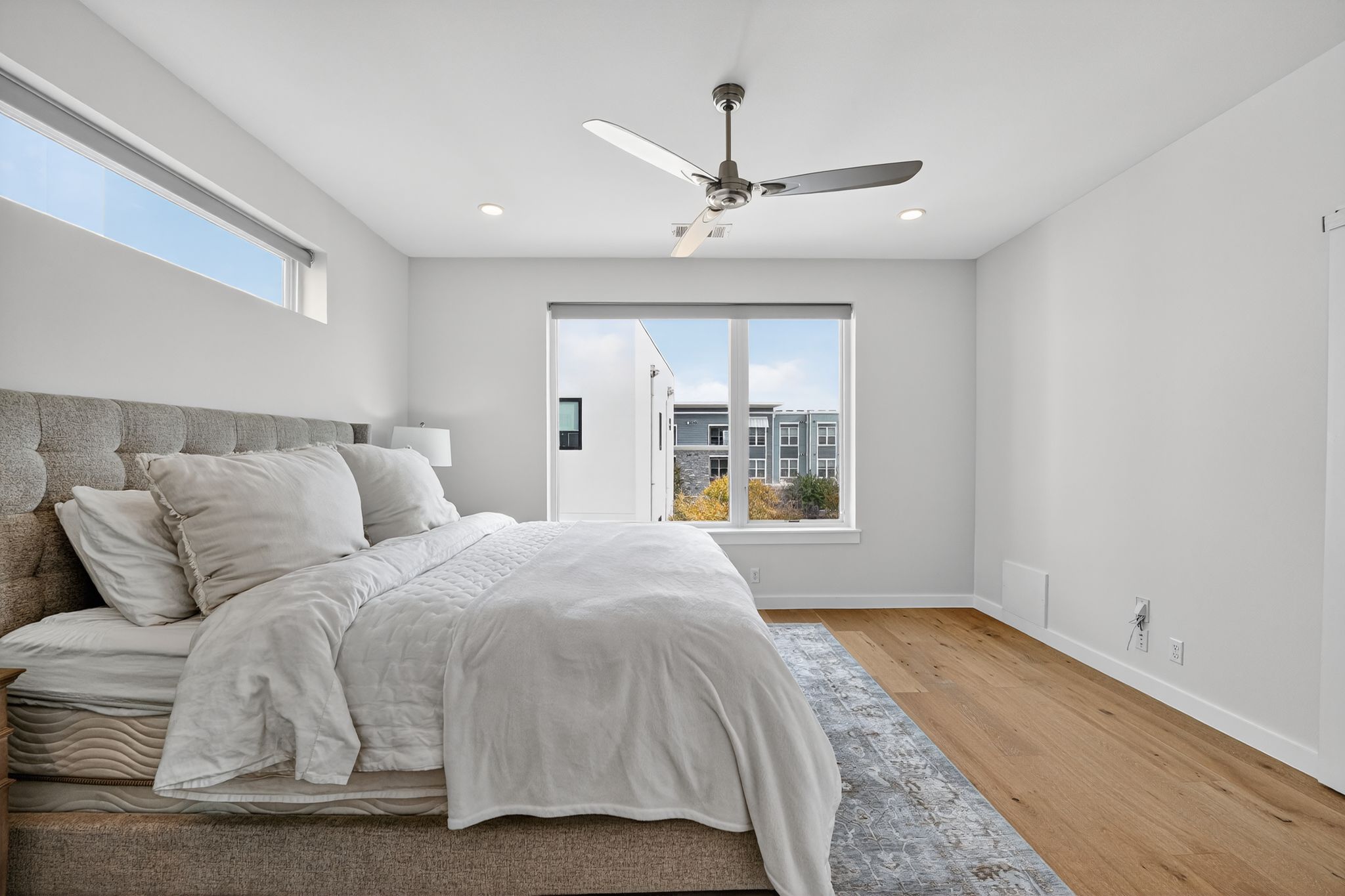 2301 Bluebonnet Lane, Unit 5 Austin, TX 78704 - Photo 3 of 26 Bedroom with light wood-type flooring, a ceiling fan, and recessed lighting