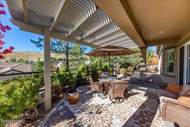 an aerial view of residential house and sandy dunes