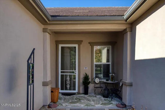 an aerial view of houses with a city