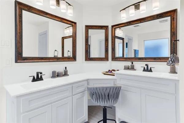 a bathroom with a bathtub and a sink
