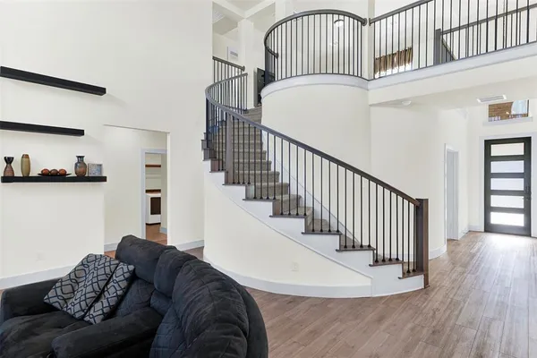a kitchen with stainless steel appliances a refrigerator and a stove
