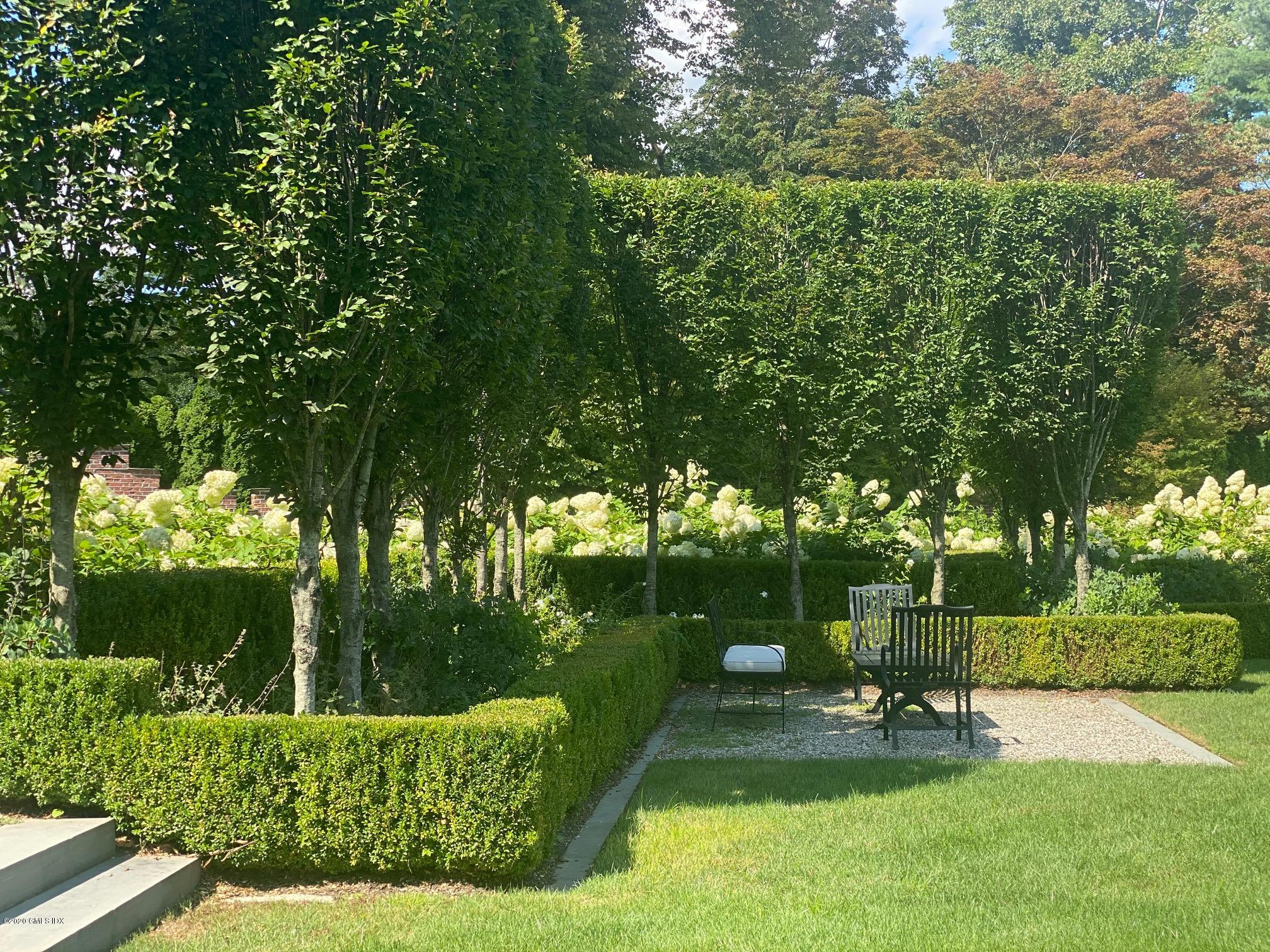 460 North Street Greenwich, CT 06830 - Photo 15 of 25 a view of a park with large trees