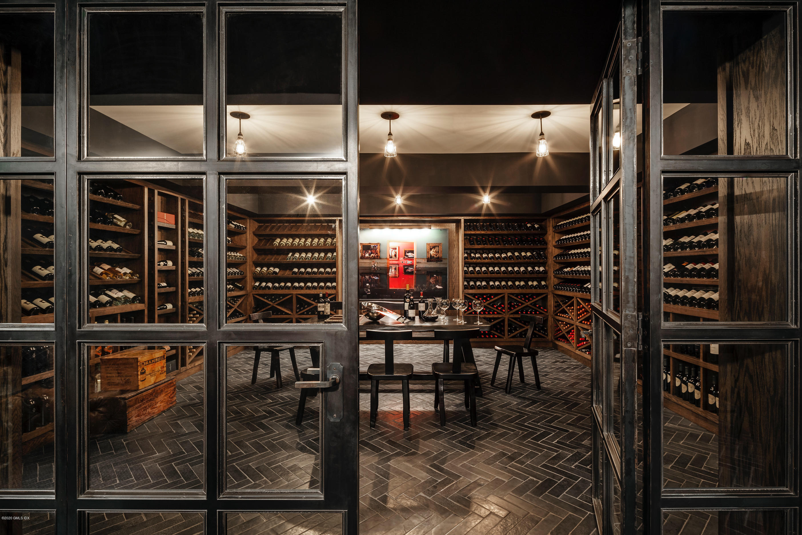 460 North Street Greenwich, CT 06830 - Photo 10 of 25 a kitchen with table and chairs