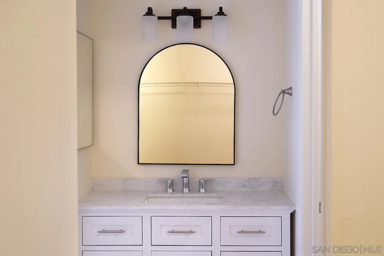 17161 Alva Road, Unit 3125 San Diego, CA 92127 - Photo 11 of 29 a bathroom with a sink and a mirror