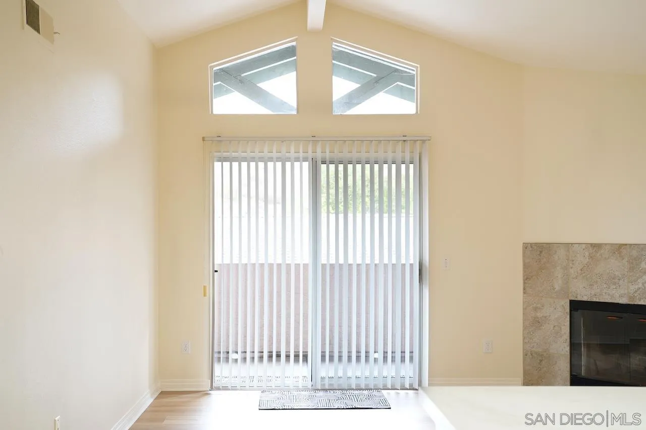 17161 Alva Road, Unit 3125 San Diego, CA 92127 - Photo 23 of 29 a view of a livingroom with wooden floor and a window