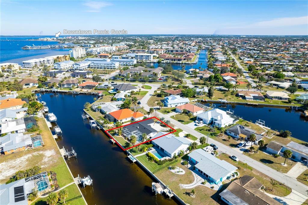 1732 Boca Raton Court Punta Gorda, FL 33950 - Photo 11 of 64 an aerial view of residential houses with outdoor space