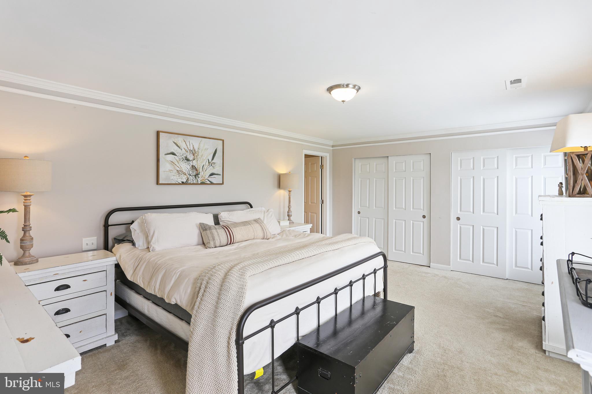 3234 Bidle Road Middletown, MD 21769 - Photo 17 of 45 a bedroom with a bed and a painting on the wall