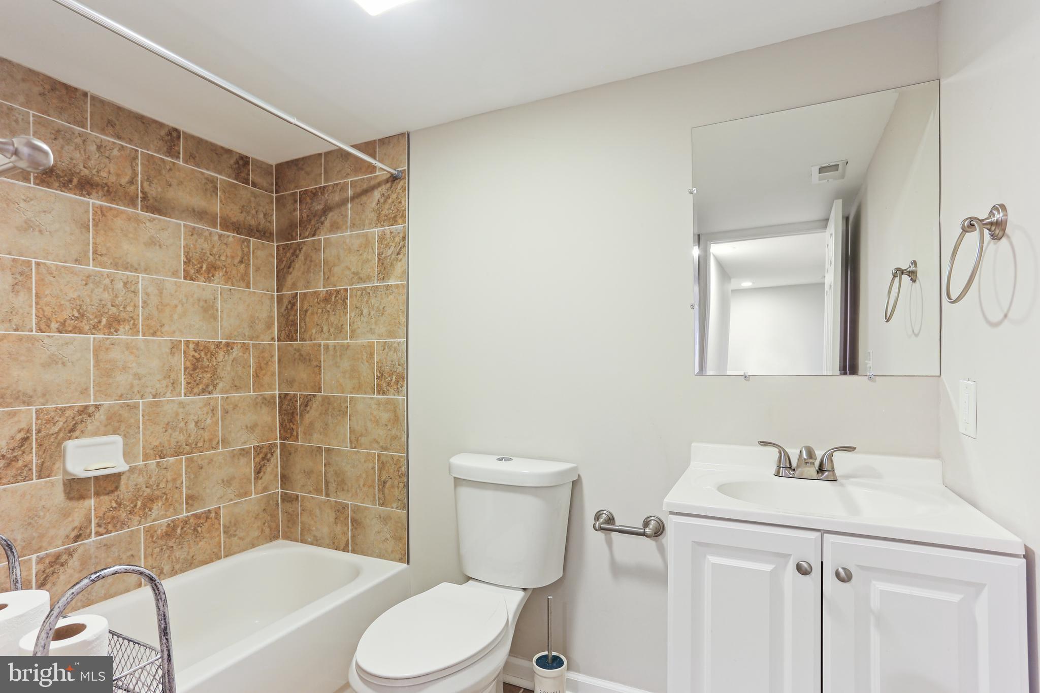 3234 Bidle Road Middletown, MD 21769 - Photo 36 of 45 a bathroom with a sink toilet and shower