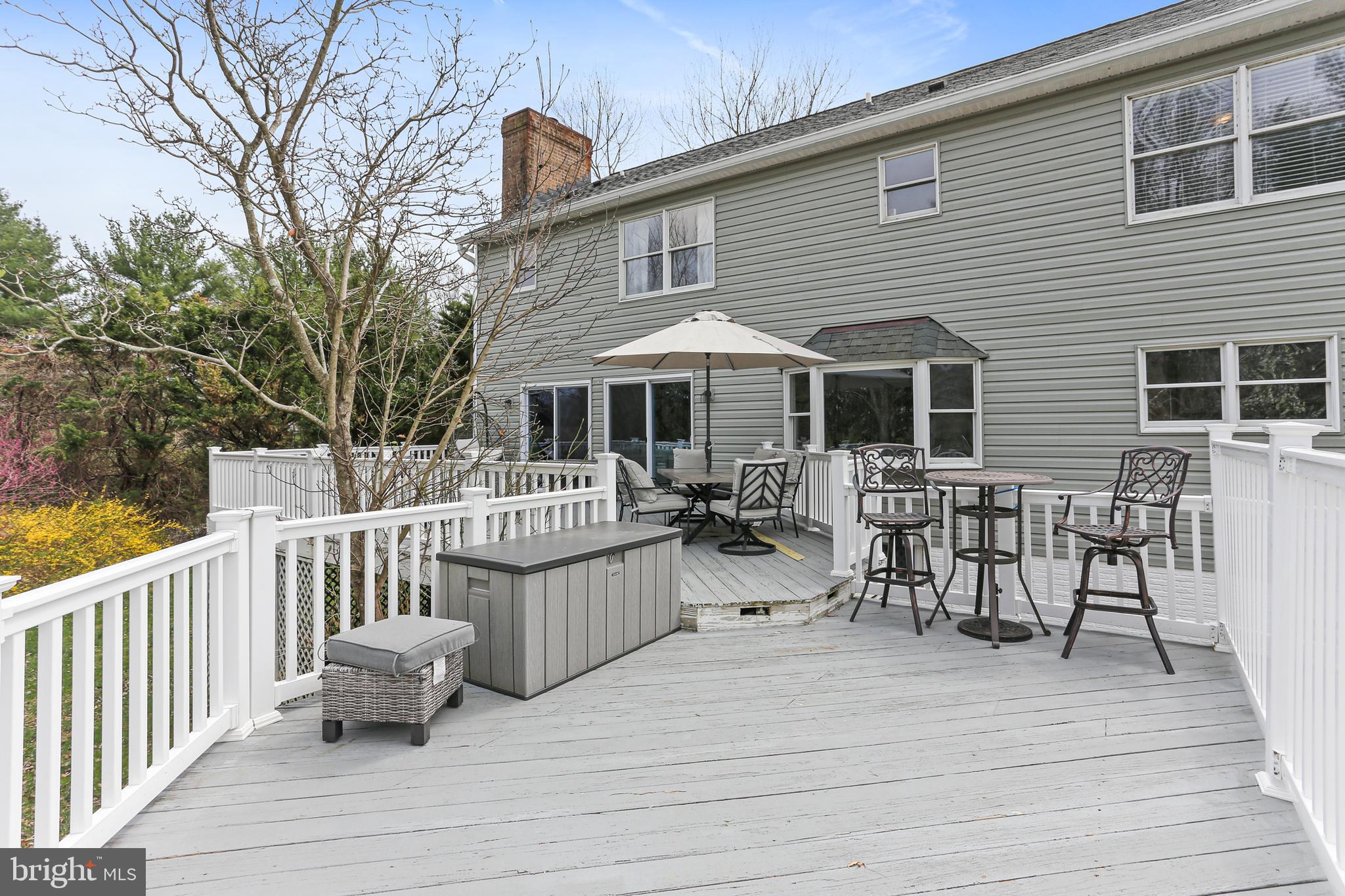 3234 Bidle Road Middletown, MD 21769 - Photo 40 of 45 a view of a house with wooden deck and furniture