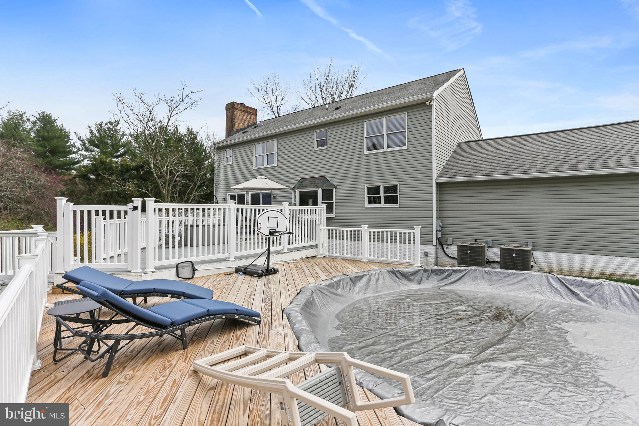 3234 Bidle Road Middletown, MD 21769 - Photo 41 of 45 a backyard of a house with table and chairs