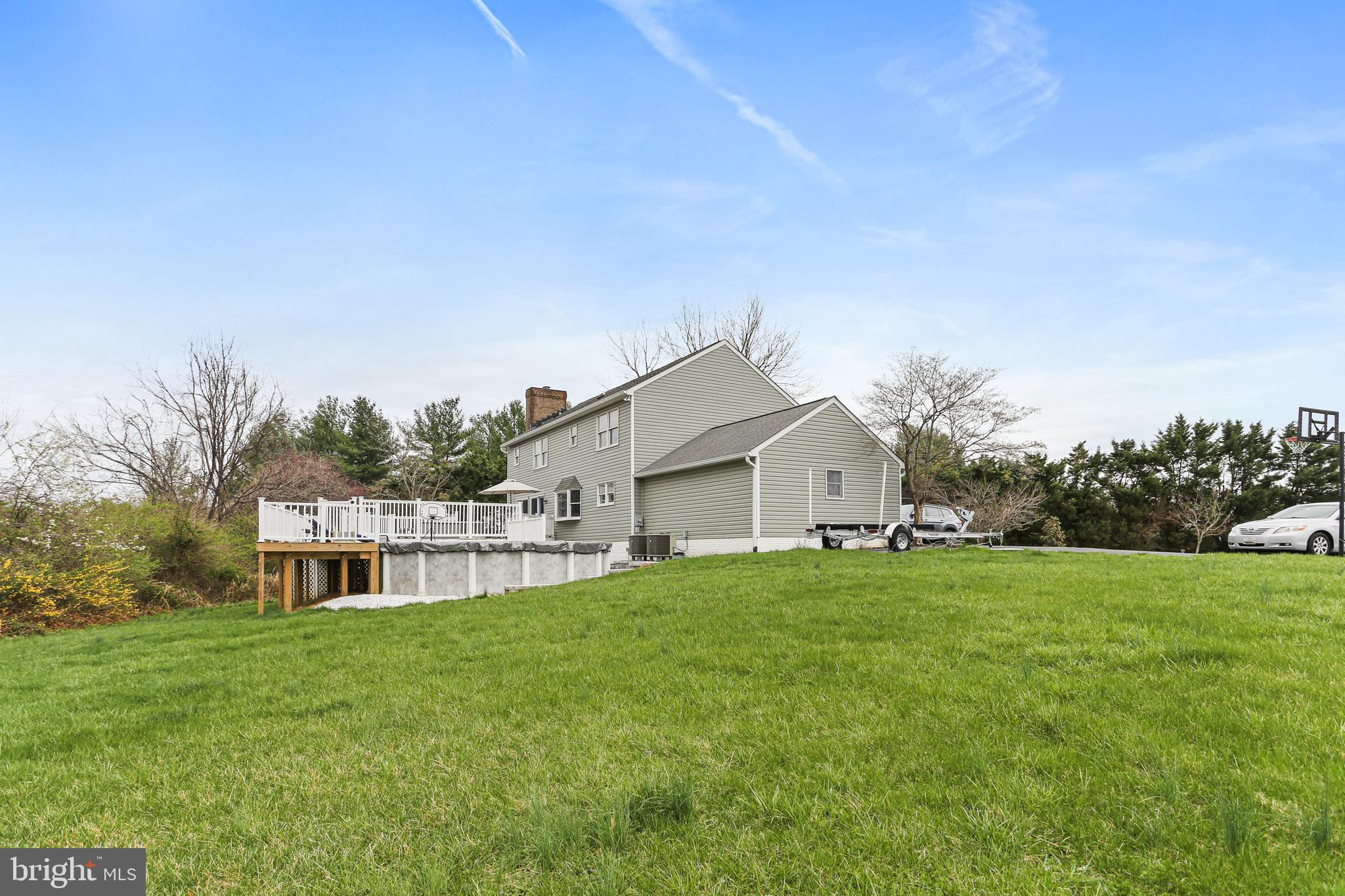 3234 Bidle Road Middletown, MD 21769 - Photo 45 of 45 a view of a house with a big yard and large trees