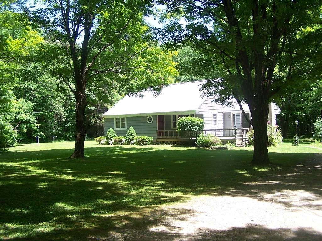 147 Hardwick Road Petersham, MA 01366 - Photo 1 of 13 a view of a garden with a tree