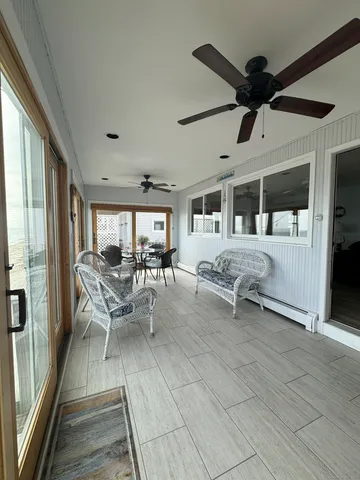 a living room with a couch and a table