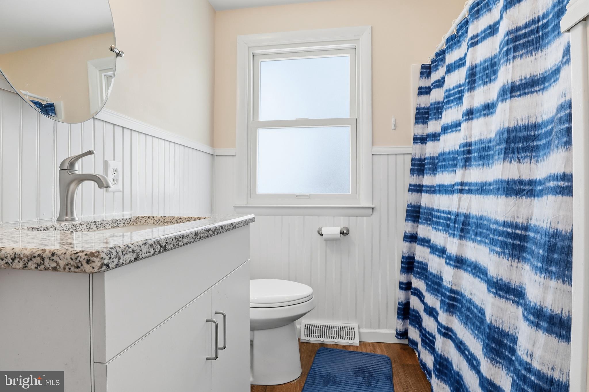521 South Findlay Street York, PA 17402 - Photo 29 of 45 a bathroom with a granite countertop sink toilet and shower
