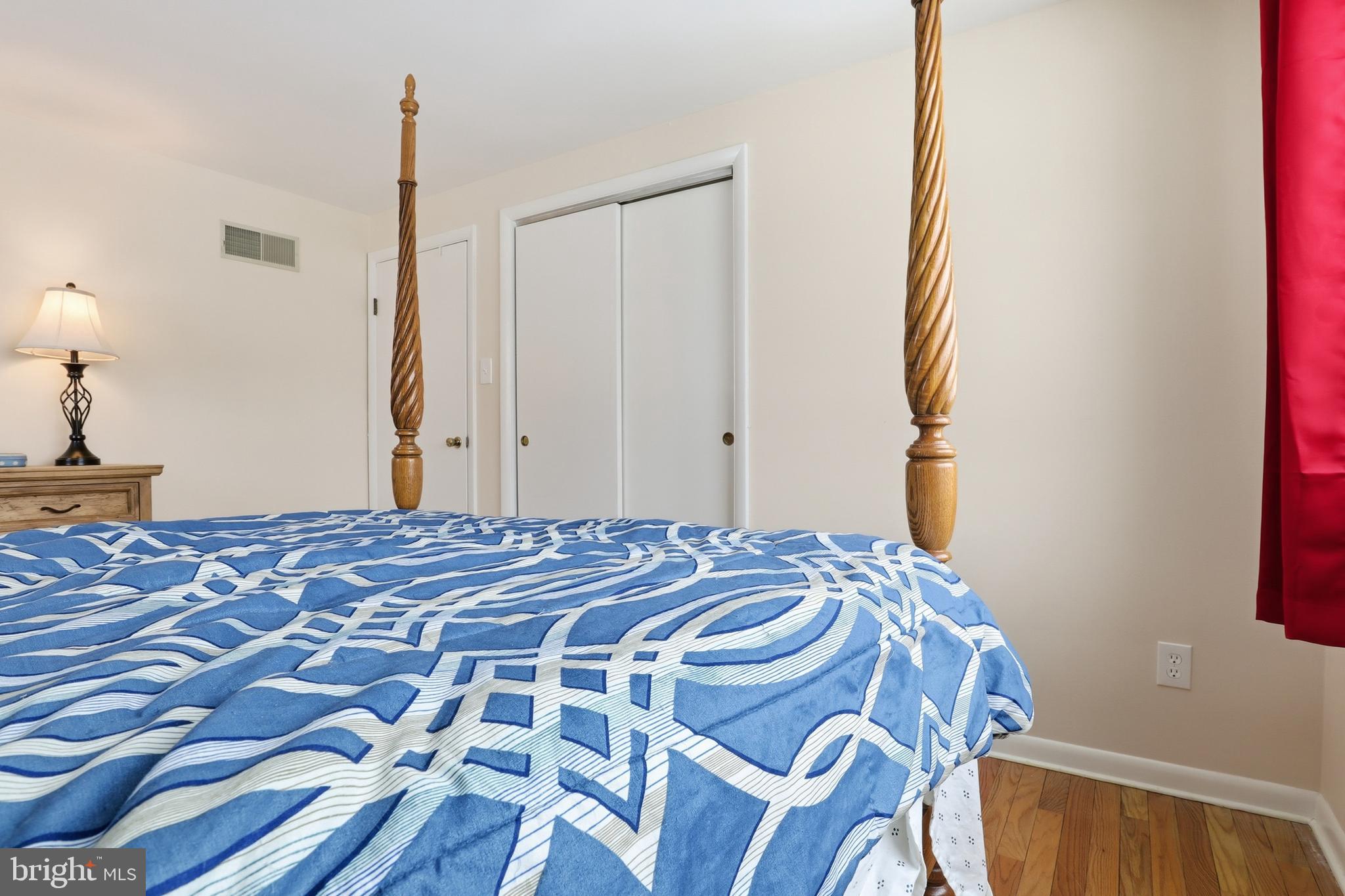 521 South Findlay Street York, PA 17402 - Photo 32 of 45 a bedroom with a bed and a lamp