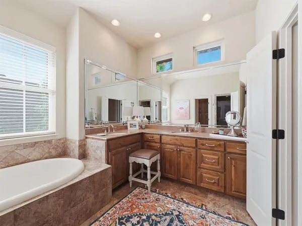 a kitchen with sink cabinets and window
