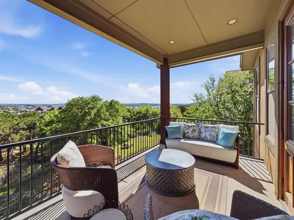 a view of a chairs in the roof deck