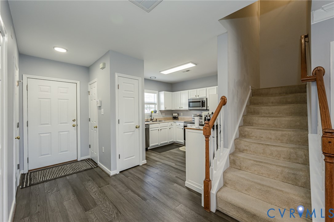 4070 Trisha Trail Midlothian, VA 23112 - Photo 12 of 40 Kitchen featuring white cabinets, light countertop