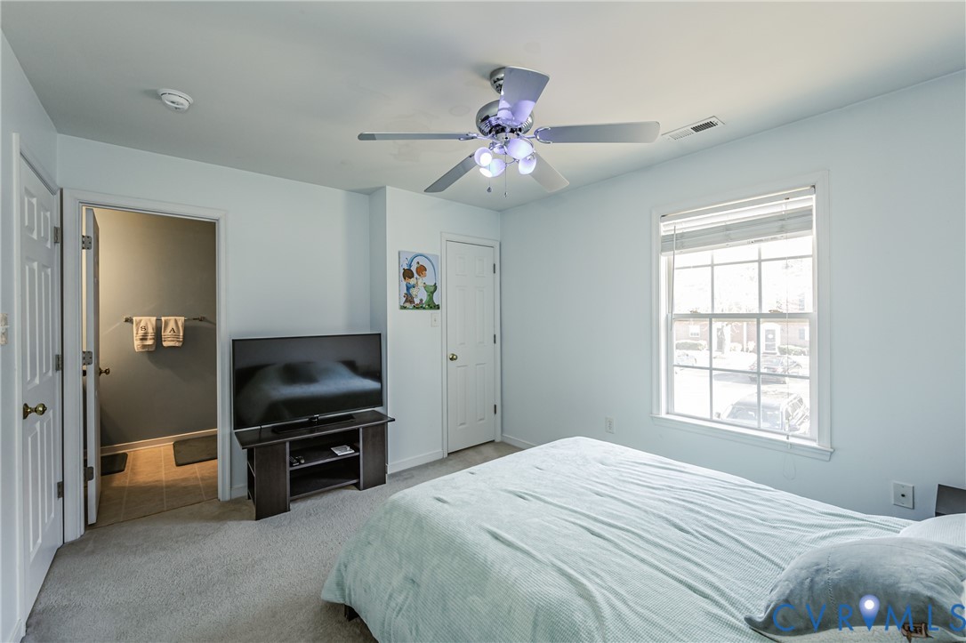 4070 Trisha Trail Midlothian, VA 23112 - Photo 31 of 40 Carpeted bedroom featuring ceiling fan and baseboa