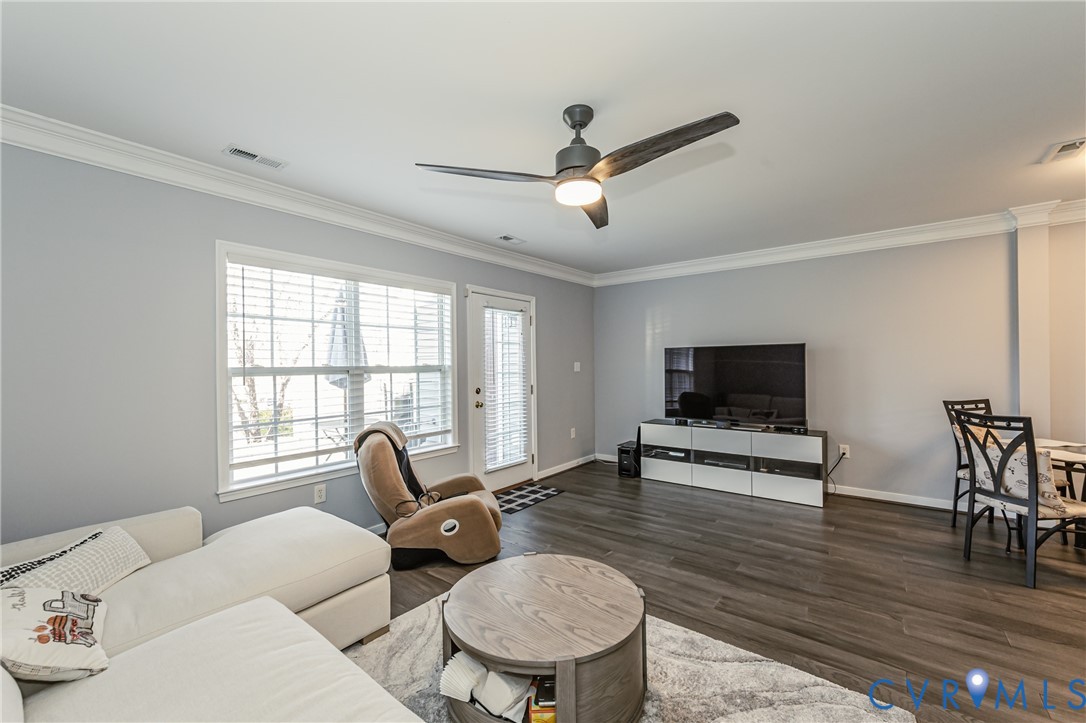 4070 Trisha Trail Midlothian, VA 23112 - Photo 32 of 40 Living room featuring dark wood-style flooring, cr