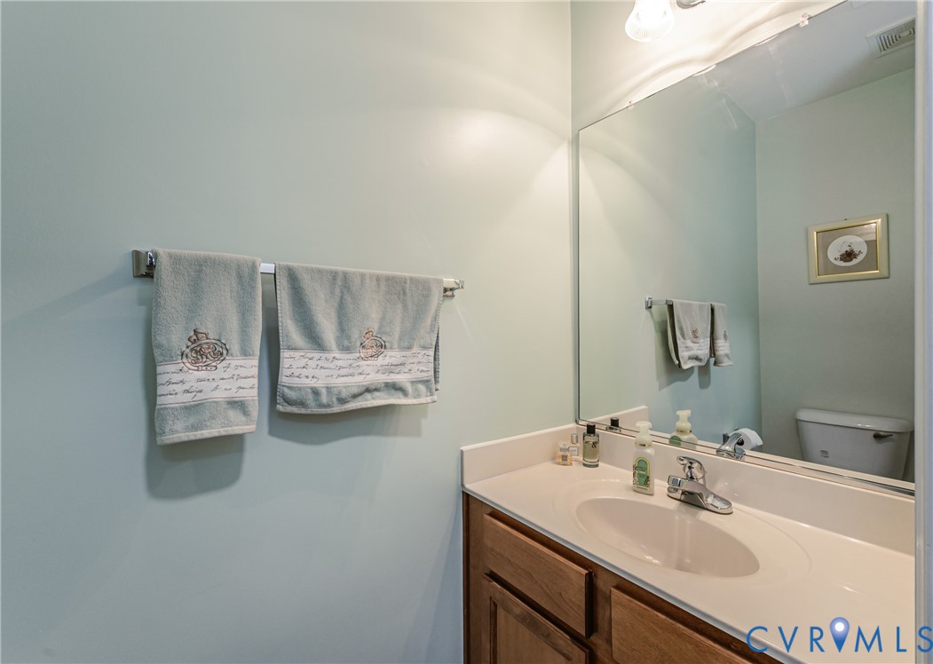 4070 Trisha Trail Midlothian, VA 23112 - Photo 36 of 40 Bathroom featuring vanity and toilet