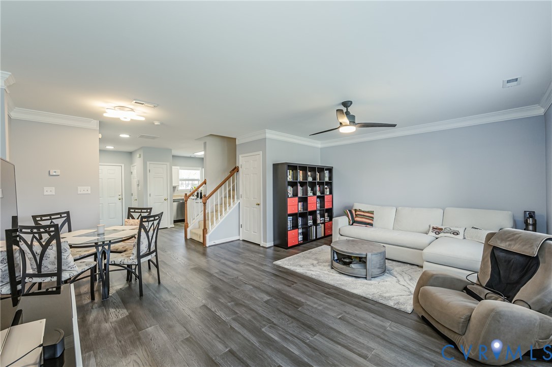4070 Trisha Trail Midlothian, VA 23112 - Photo 5 of 40 Living area featuring crown molding, stairs, dark