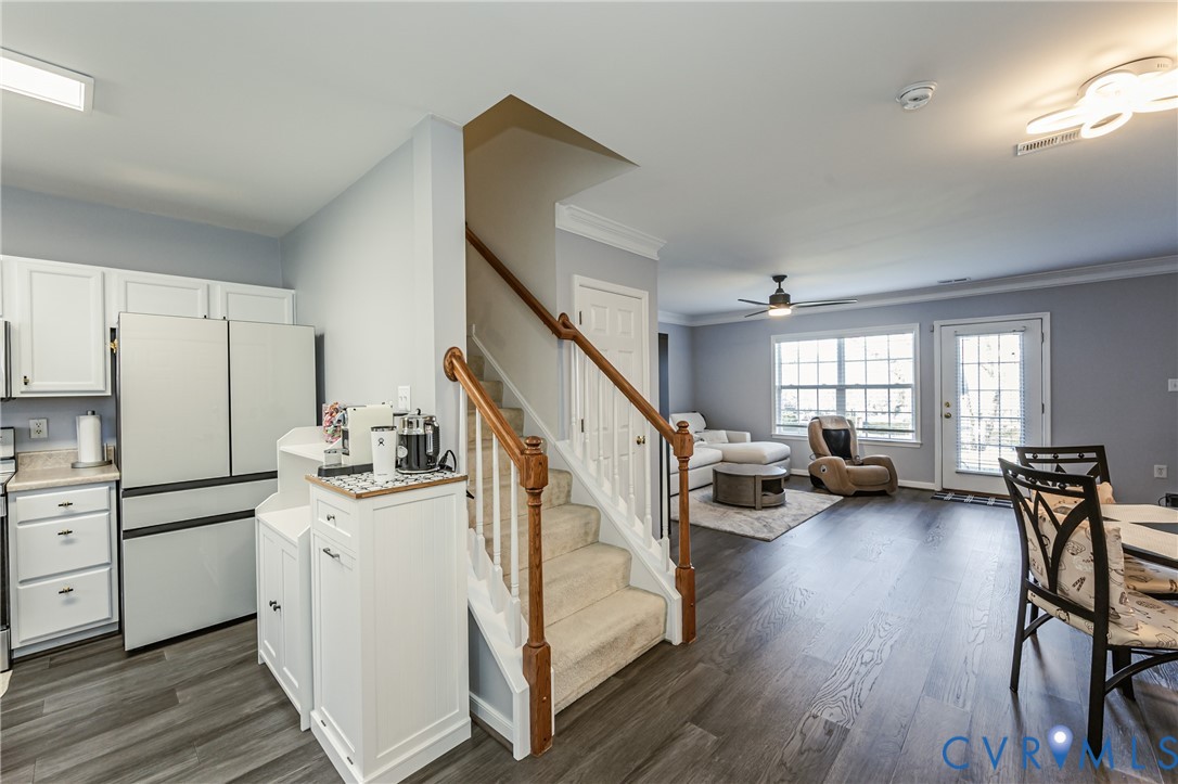 4070 Trisha Trail Midlothian, VA 23112 - Photo 6 of 40 Kitchen with white cabinetry, light countertops, f