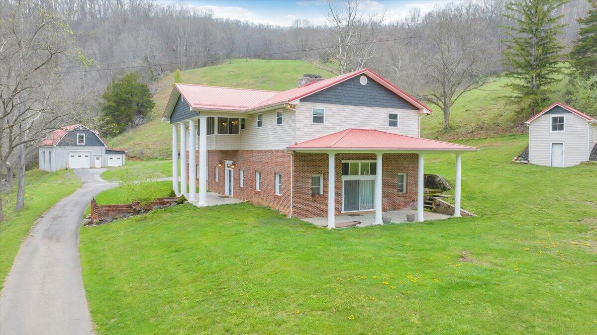 7415 Clear Fork Creek Road Bastian, VA 24314 - Photo 5 of 117 a view of a house with a yard balcony and sitting area