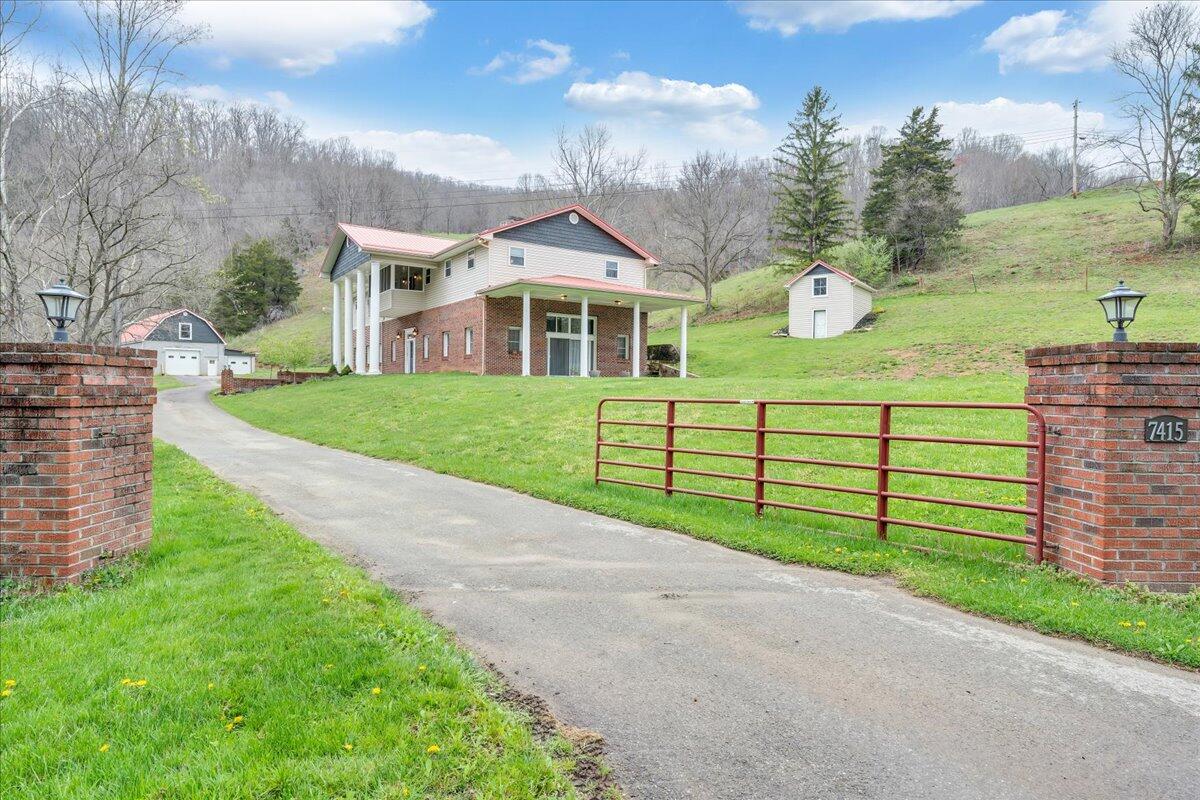 7415 Clear Fork Creek Road Bastian, VA 24314 - Photo 89 of 117 a front view of a house with garden