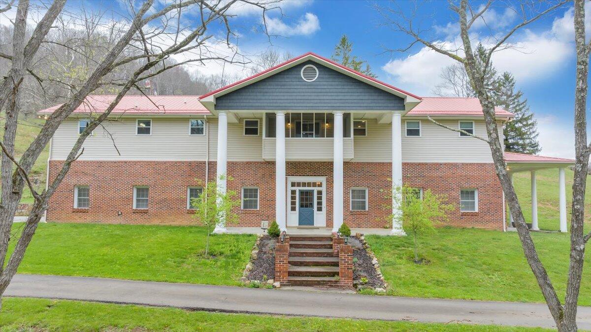 7415 Clear Fork Creek Road Bastian, VA 24314 - Photo 95 of 117 a front view of a house with a yard