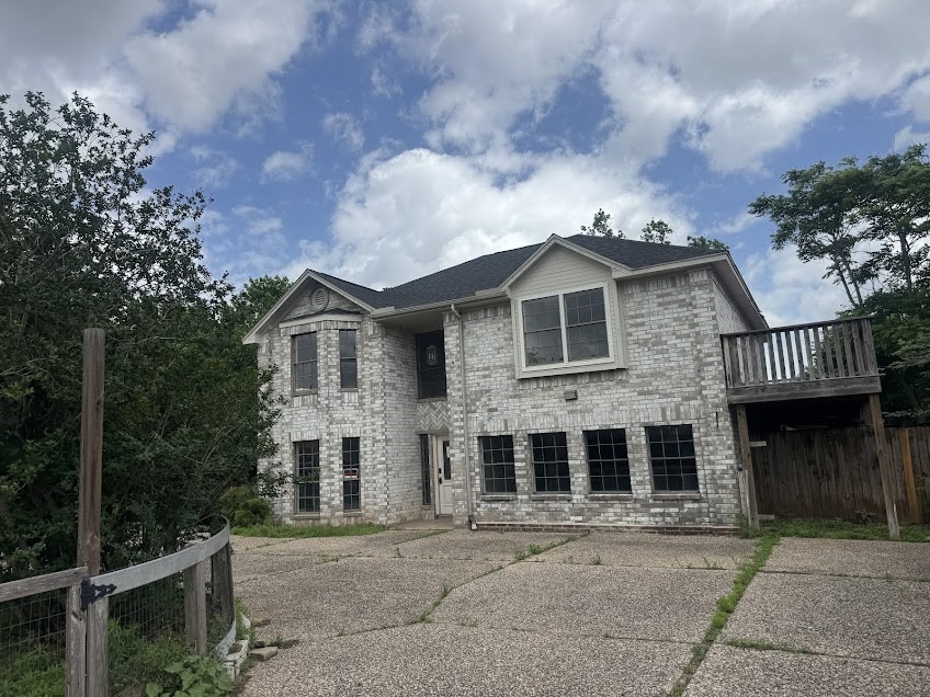 5407 Victoria Drive Rosharon, TX 77583 - Photo 1 of 23 a front view of a house with a yard