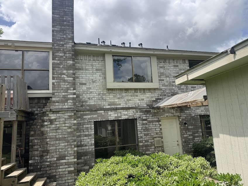 5407 Victoria Drive Rosharon, TX 77583 - Photo 19 of 23 a front view of a house with a garden