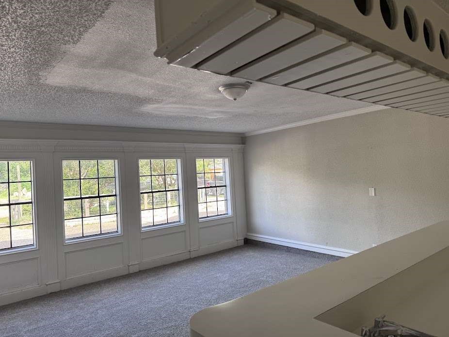 5407 Victoria Drive Rosharon, TX 77583 - Photo 5 of 16 an empty room with windows