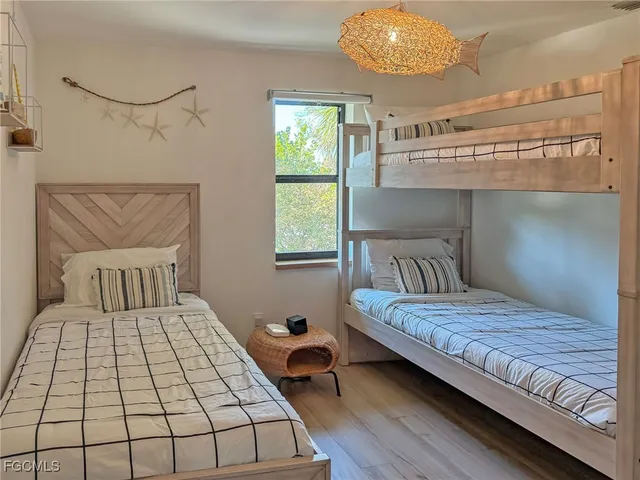 a view of a bedroom from a hallway