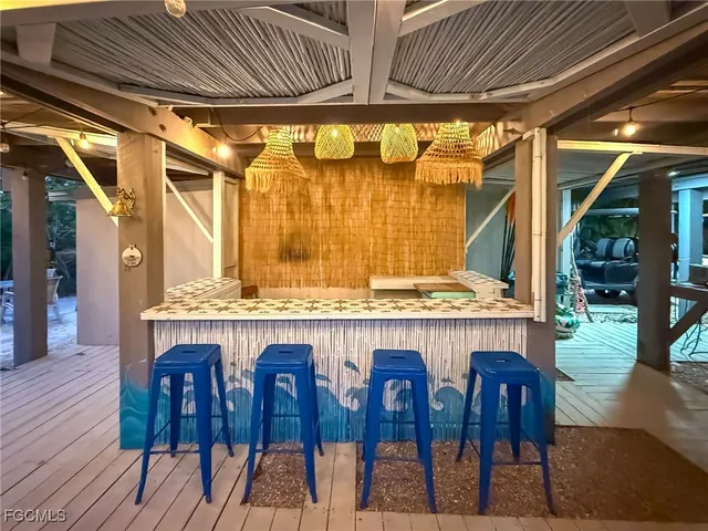 a view of balcony with wooden floor