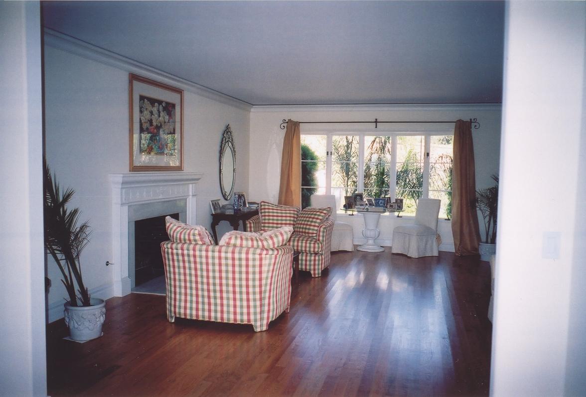 161 Rametto Road Santa Barbara, CA 93108 - Photo 4 of 8 a living room with furniture wooden floor and a fireplace