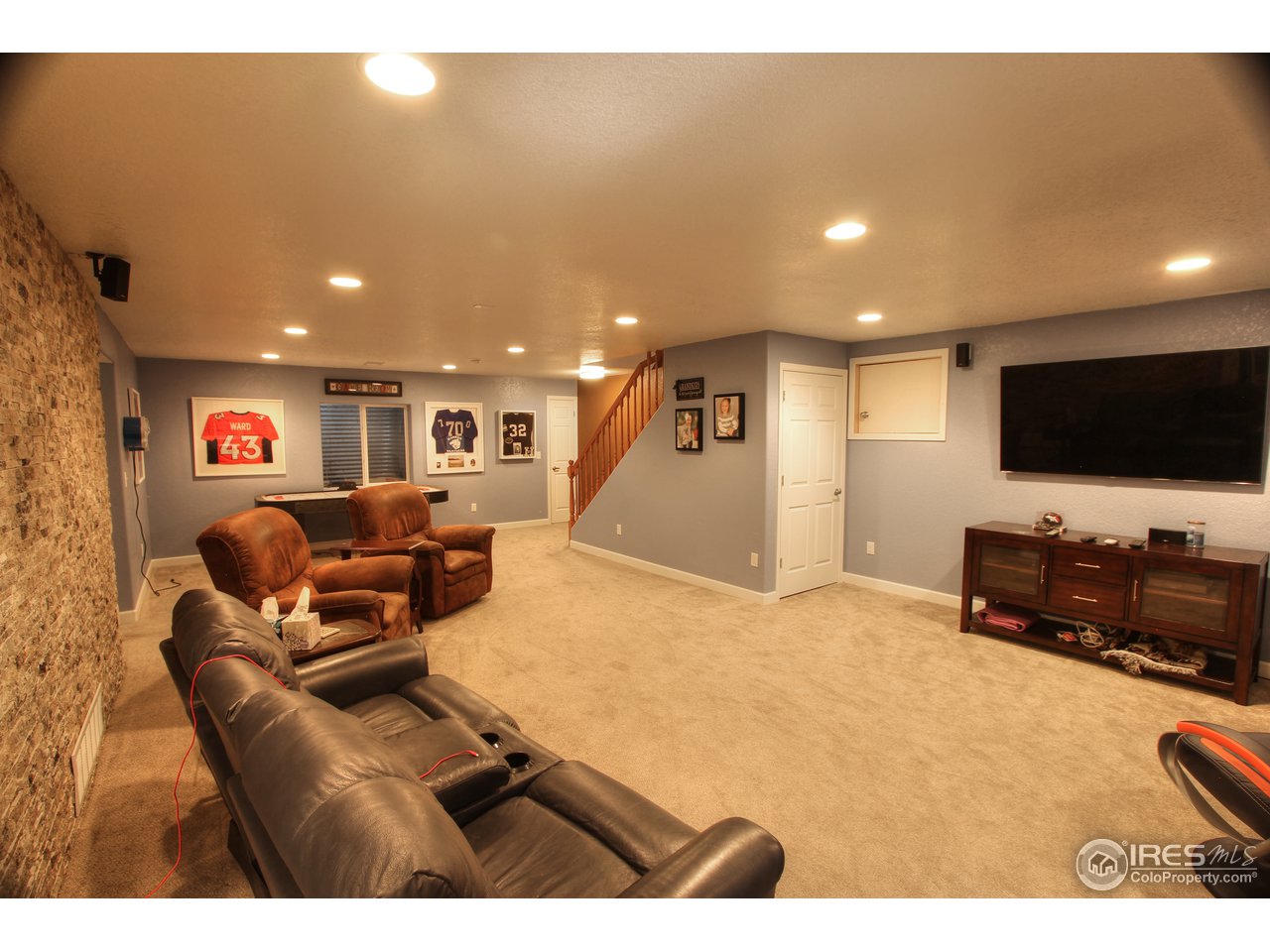 955 Cooper Hawk Road Eaton, CO 80615 - Photo 16 of 23 Basement Home Theater Area