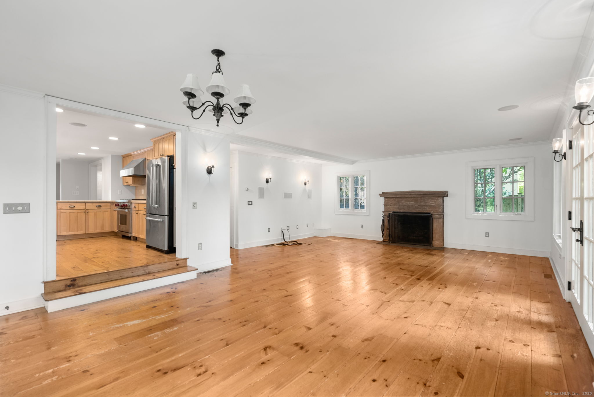 112 Hillspoint Road Westport, CT 06880 - Photo 10 of 36 Family Room with wood burning fireplace and dining area