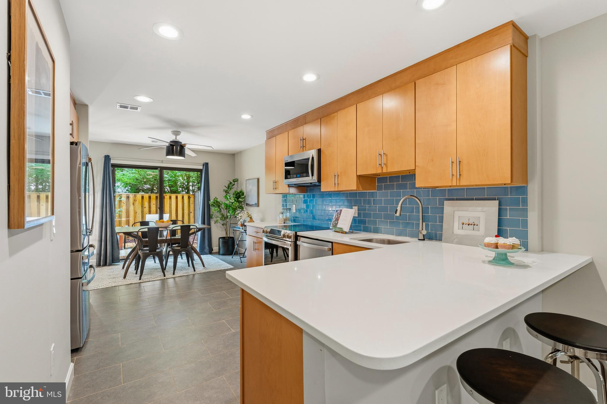 1953 Winterport Cluster Reston, VA 20191 - Photo 5 of 38 Kitchen w/contemporary cabinets & glass backsplash