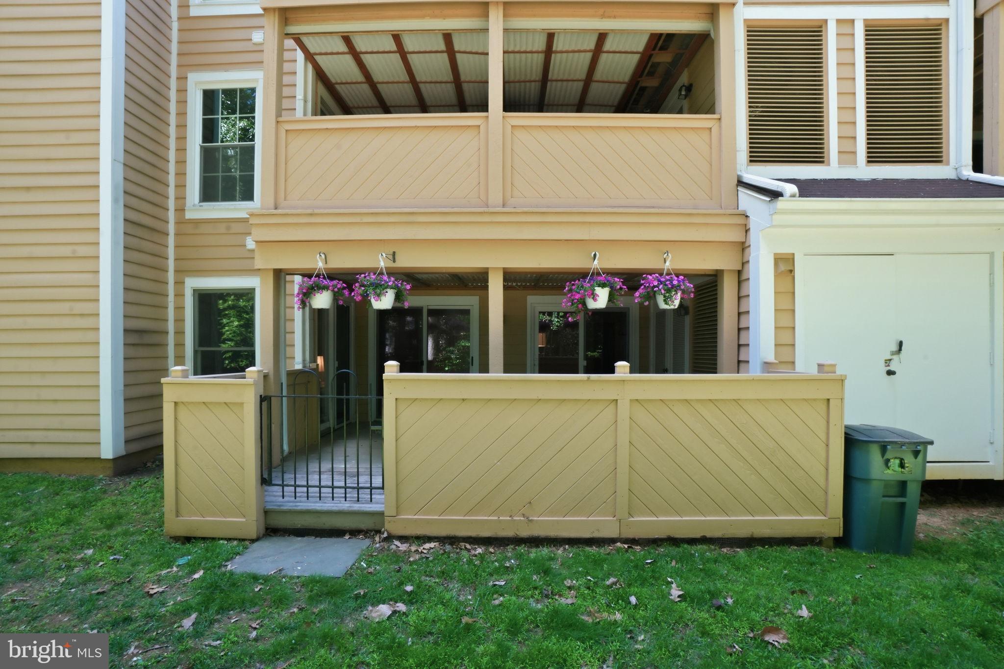 1495 Church Hill Place Reston, VA 20194 - Photo 24 of 27 front view of a house with a small yard