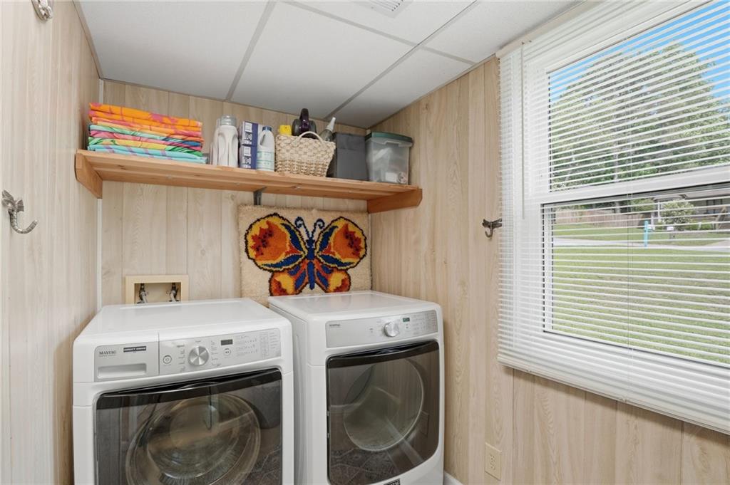 338 Arbour Way Suwanee, GA 30024 - Photo 19 of 32 a utility room with dryer and washer