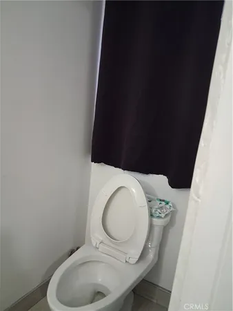 a close view of a toilet in a bathroom