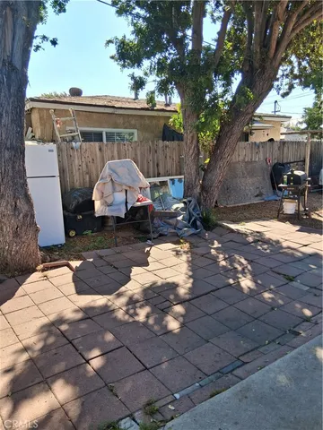a view of a yard with an outdoor space