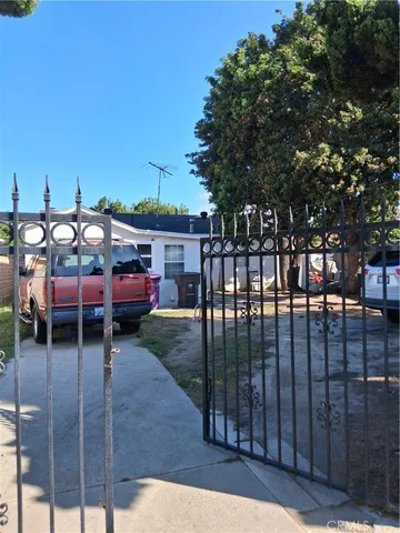 a view of street with parked cars