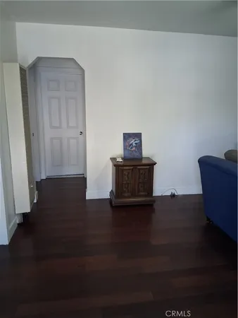 a view of livingroom with furniture and wooden floor